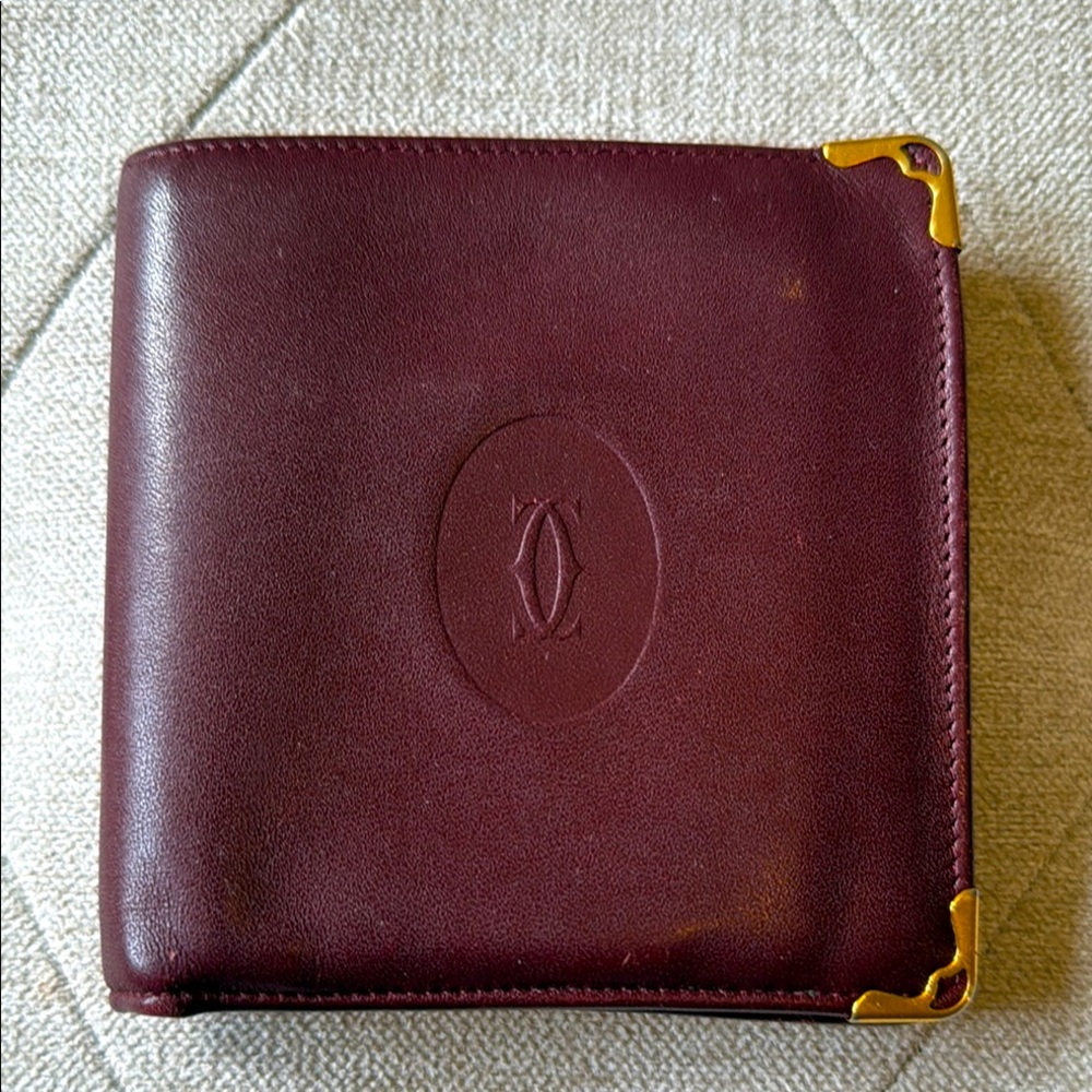 Cartier Bordeaux Leather Wallet with Gold Accents